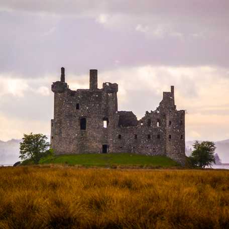 A picture showing Kilchurn Castle, taken from a north, north-east orientation