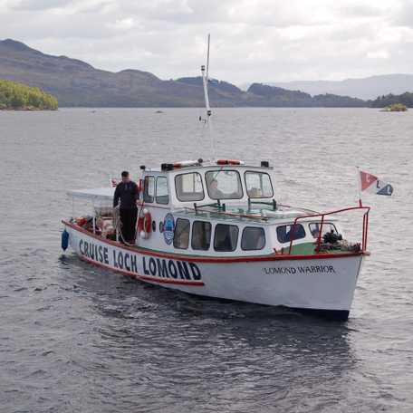 The ferry boat Lomond Warrior approaching Luss, Loch Lomond